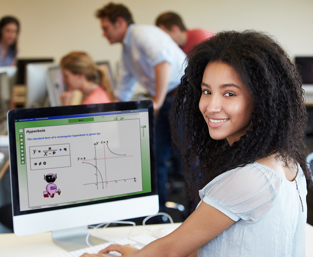 Female College Student Using Computer In Classroom Female College Student Using Computer In Classroom